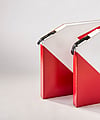 A space-saving corrugated packaging solution designed for flat automotive components.