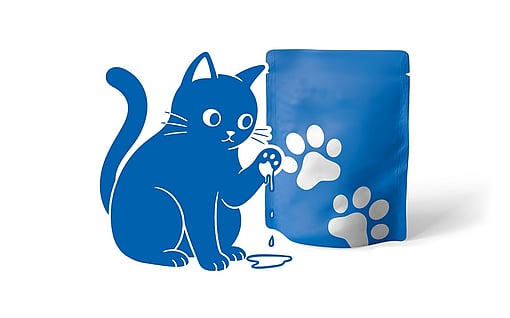 Illustration of a stylised blue cat holding a small item, sitting next to a blue packaging bag with paw print graphics.