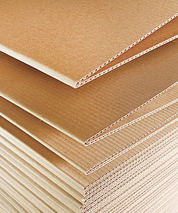 Close-up image of fanfold corrugated cardboard.