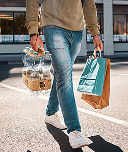 A man carrying his groceries.