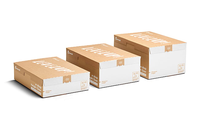three boxes lined up in a row growing in size