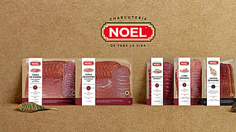 packages of meat lined up against a brown background