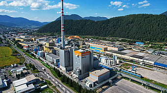 aerial shot of a Mondi production site set against blue skies and plenty of greenery