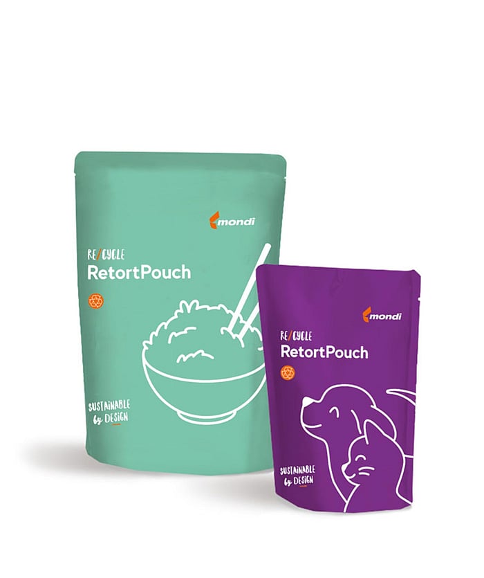Illustration of two retort pouches in green and purple, each with a stylised animal line drawing on the packaging.