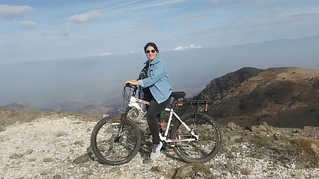 Kadriye Bilgin on a bicycle