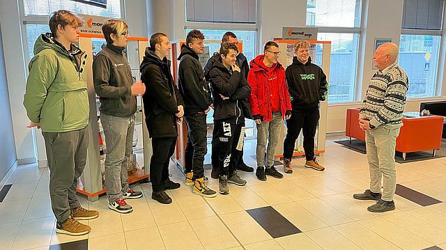 Rudko guiding a group of students