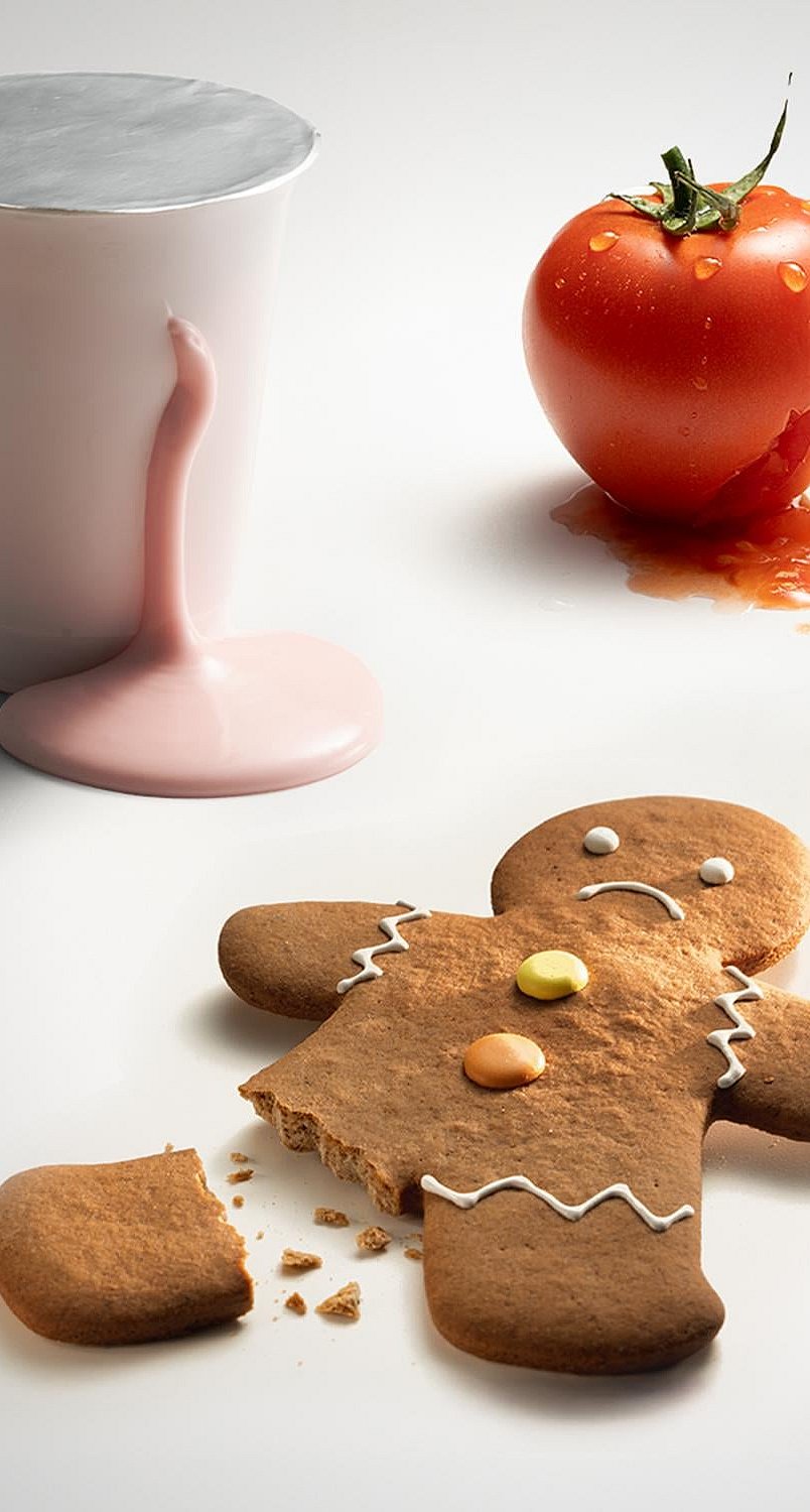 A spilled yoghurt pot, a squished tomato, a broken chicken nugget, a gingerbread man with a broken leg.